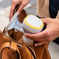 Breast pump featuring a transparent breast shield for convenient positioning