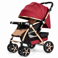 Burgundy baby stroller with large canopy, padded seat and gold-tone frame