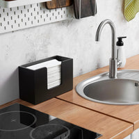 C-fold paper towel dispenser for countertop organization