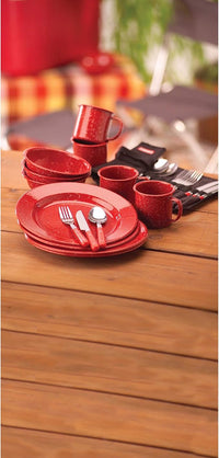 Durable camping dinnerware set with plates, cups, and flatware for outdoor dining