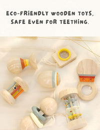 Colorful wooden baby rattles arranged together on a plain background