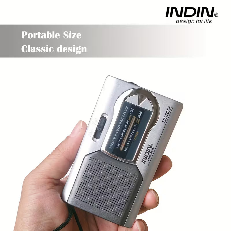 Compact AM FM radio with built-in speaker for indoor outdoor and emergency use
