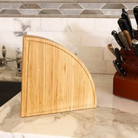 Compact folding bamboo cheese board in wedge configuration