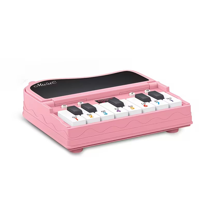 Compact keyboard music toy for home and travel play