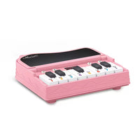 Compact keyboard music toy for home and travel play