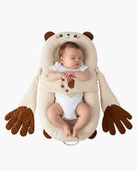 Front view of cream bear-shaped baby lounger