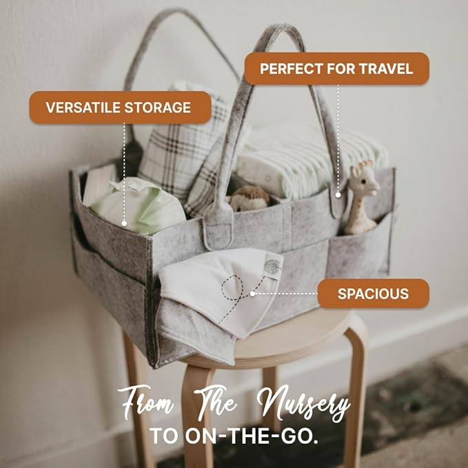 Overhead view of a baby diaper caddy showing removable dividers and compartments