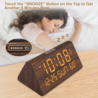 Digital alarm clock with date and day of week display for home use