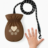 Dog leash with warm gloves designed for winter outdoor walks