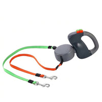 Double retractable dog leash with a convenient handheld design