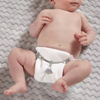 Eco-friendly cloth diaper fasteners, reusable and safe for babies.