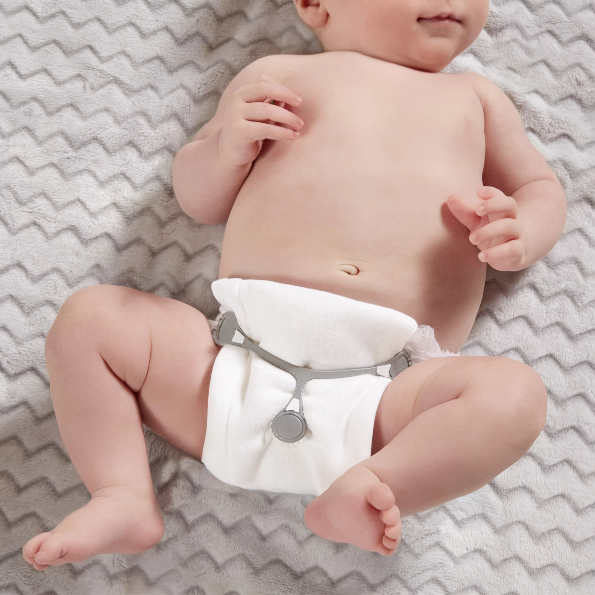 Eco-friendly cloth diaper fasteners, reusable and safe for babies.