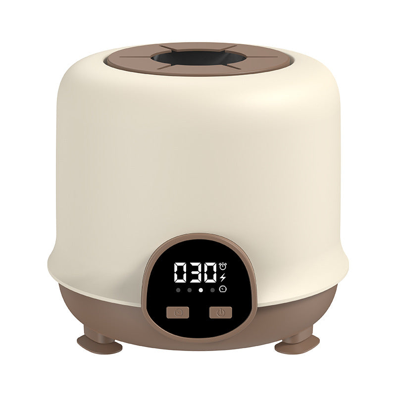 Electric baby bottle warmer with digital display and compact countertop design