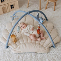 Enlarged baby tummy time mat with soft padded surface