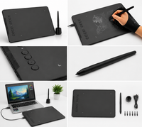Graphic drawing tablet connected to PC and laptop setup
