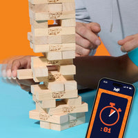 Family game night with stacking tower block game