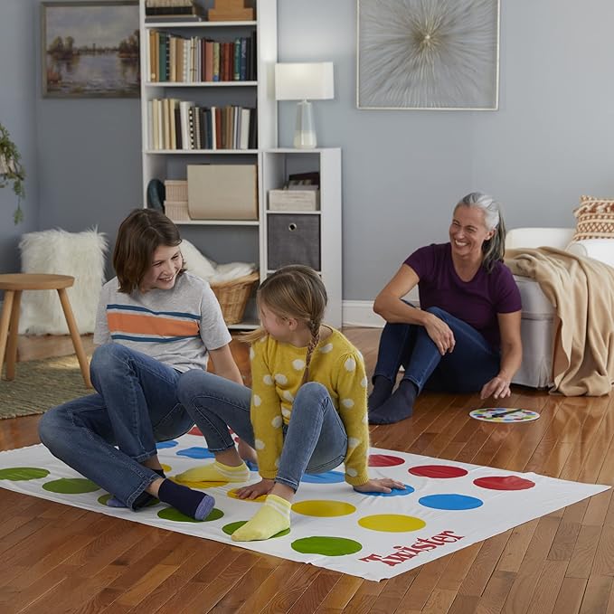 Family game night with Twister party classic game