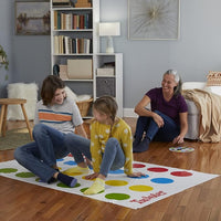 Family game night with Twister party classic game