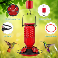 Flower-style feeding ports on glass bird feeder