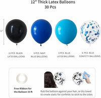 Blue foil curtain backdrop for birthday party decoration setup