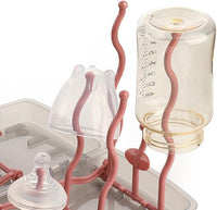Foldable bottle holder arranged for compact storage
