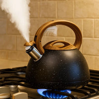 Stainless steel whistling kettle for gas and induction cookers