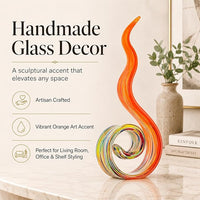 Art glass ornament displayed on an office bookshelf