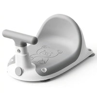 Grey baby bath seat with curved backrest, front T-shaped support handle and embossed bear design on a white background.