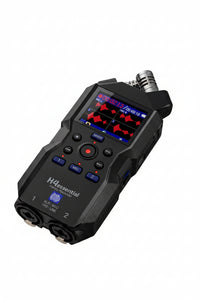 Close-up view of XLR inputs on handheld audio player