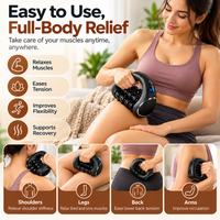 Electric fitness massage accessory displayed beside workout equipment.