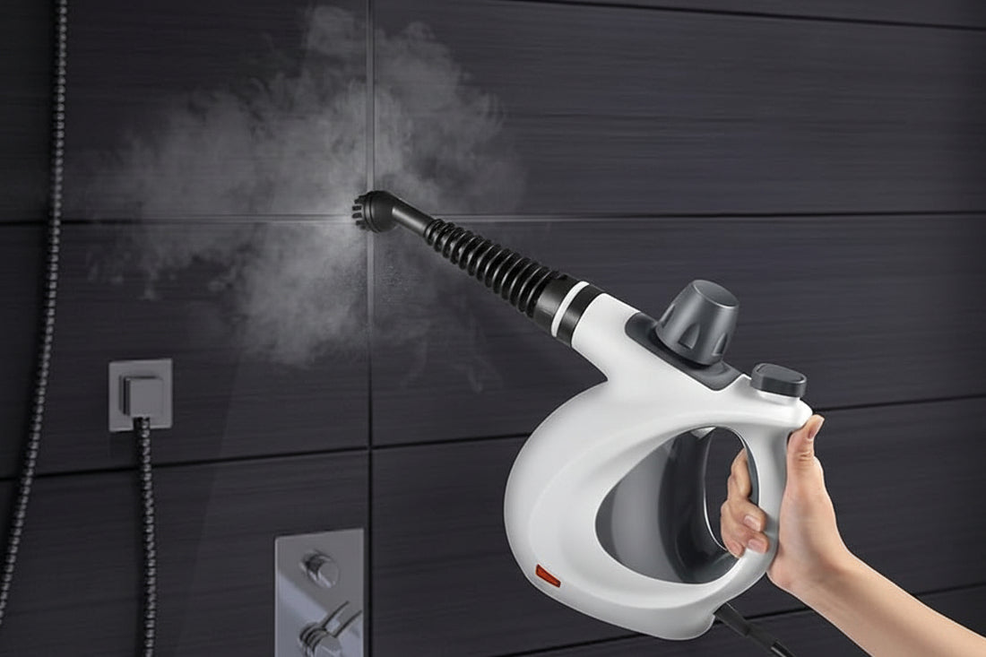 Grey handheld multi-surface steam cleaner with accessories