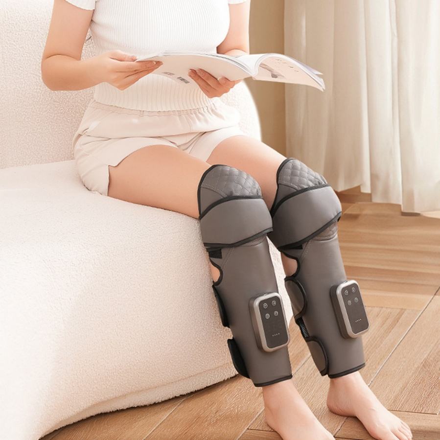 Heated vibration knee wrap in a grey and black finish