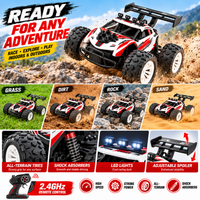 Side profile of a high-speed style RC car with off-road tires and detailed vehicle body.