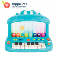 Hippo piano toy with an electronic keyboard for hands-on musical activities.