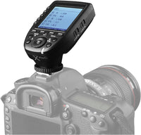 flash trigger mounted on canon camera hot shoe