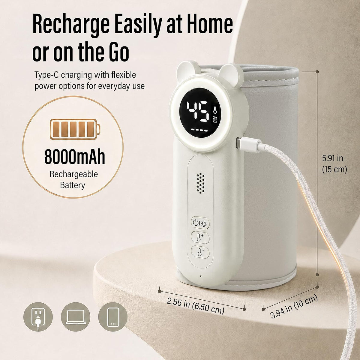 Front view of the compact cylindrical milk warming appliance with control buttons