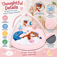 Soft padded infant tummy time floor mat with overhead activity arches