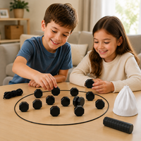 Two children happily playing with a magnetic strategy board game