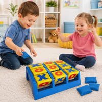 Kids playing tic tac toe toss game with bean bags for indoor activity play