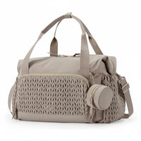 Large neutral baby diaper bag with spacious storage and shoulder strap