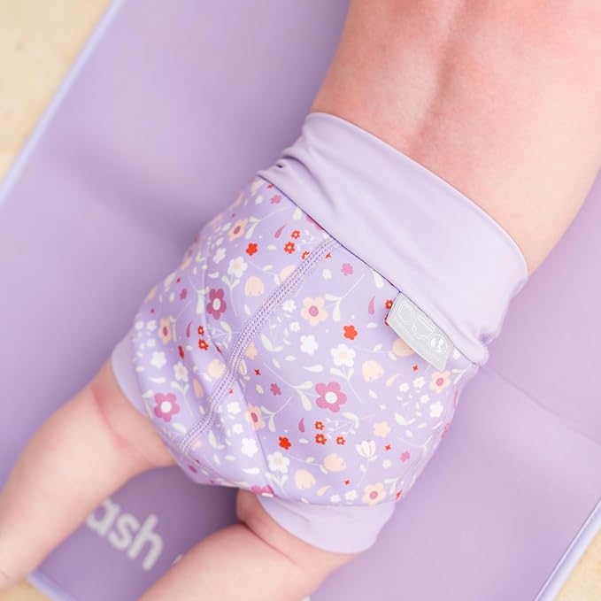 Leakproof swim diaper for babies, reusable, soft, and adjustable design.