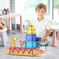 Magnetic building blocks for kids ages 3 and above arranged for imaginative play.