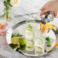Cocktail set with measuring jigger and mixing spoon