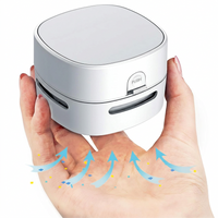Mini Desk Vacuum Cleaner Powered by 2 AA Batteries, Ideal for Cleaning Desktops, Drawers, and Countertops, White.