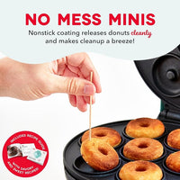 Electric mini dessert maker with donut-shaped cooking molds