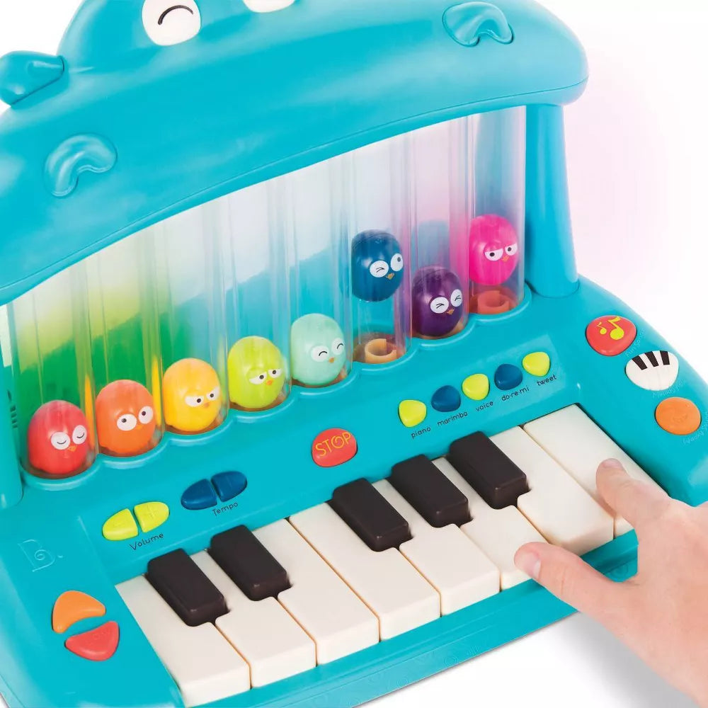 Mini piano toy for toddlers with musical keys and interactive electronic sounds.