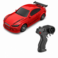 Mini RC car operating on a desktop racing track