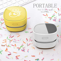 White Mini Vacuum Cleaner Powered by AA Batteries for 90 Minutes of Use.