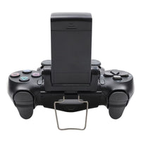Phone mounted on controller for mobile gaming setup