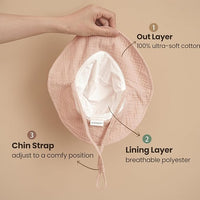 Muslin baby hat offering sun protection with wide brim